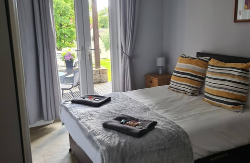 Saint Ann's Chapel Cabin | Beautiful 3 Bedroom Lodge with private hot tub onsite indoor and outdoor pools