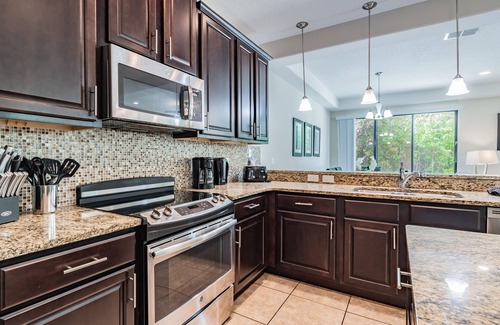 Four Corners House | Beautiful 4 bedroom luxury townhome in Championsgate 8219 RB