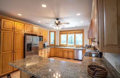 Wild Rose House | Beautiful 8000 Sq. Ft. Log Home With 250 Feet Of Private Frontage on Kusel Lake