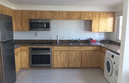 Orange Bay House | Beautiful and tastefully furnished Townhouse - Ocean views and private beach.