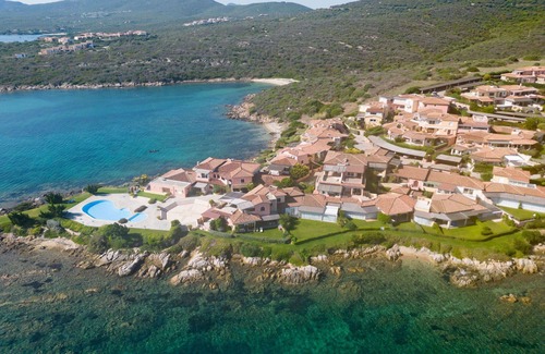 Baia Caddinas Apartment | Beautiful apartment for 6 guests with A/C, WIFI, pool, TV, terrace and pets allowed