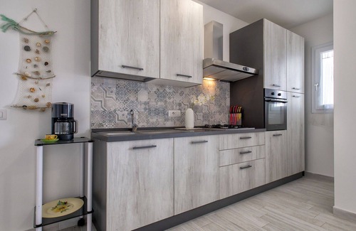 La Muddizza Apartment | Beautiful apartment for 6 people with pool, WIFI, A/C, TV, patio, pets allowed and parking