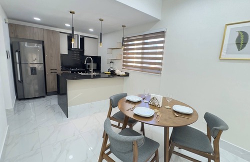 Yolanda Morales Apartment | Beautiful Apt in Piantini Rooftop Views, Gym & Central