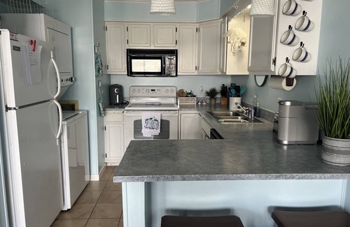 Midtown Ocean City Condo | Beautiful bayside first level condo! Quick walk to the beach.