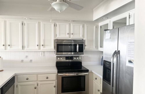 Sunnyside House | Beautiful Beachfront Townhouse; steps away from a quiet beach.