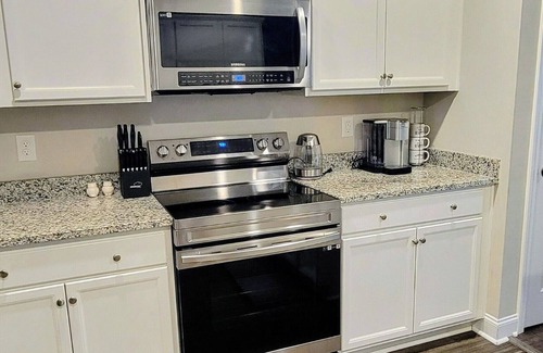 Sunset Beach House | Beautiful beach themed 4-bdrm home in Sunset Beach. Newly added private fencing!