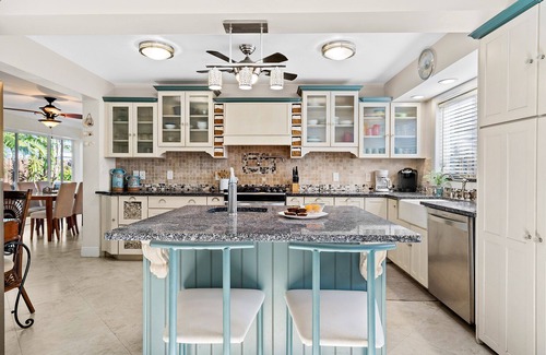 Birch Park Finger Streets House | Beautiful Beach House with pool, lush tropical landscaping steps from the ocean