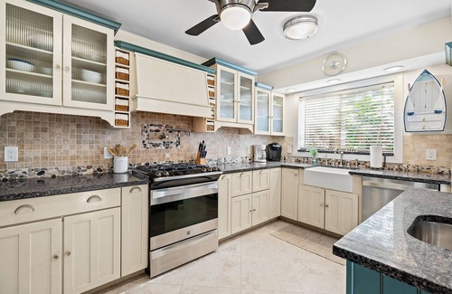 Birch Park Finger Streets House | Beautiful Beach House with pool, lush tropical landscaping steps from the ocean
