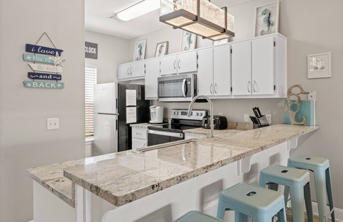 Miramar Beach House | Beautiful BeachHouse few steps to Community Pool. 5 Min Walk to Beach & shops