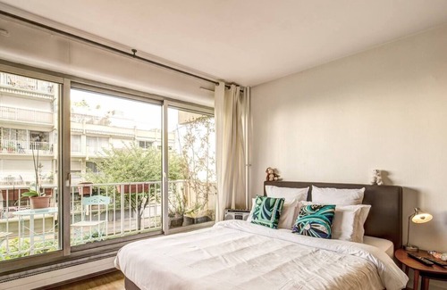 Quartier de la Folie-Mericourt Apartment | Beautiful Big Studio Apartment in Paris Rue Saint