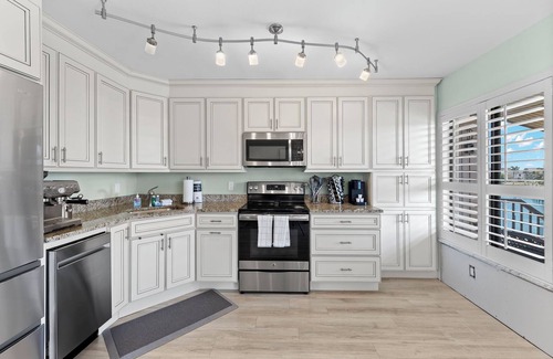 Shell Harbor Condo | Beautiful Canal Front Tennisplace C32 Condo close to everything! NEW!