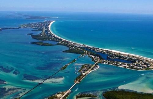 Pebble Beach House | Beautiful Canal & Gulf Waterfront Home