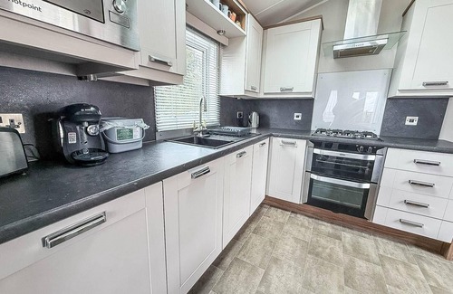 Corton House | Beautiful caravan with decking at Azure Seas ref 32060AZ