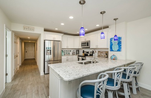 Indian Shores Condo | Beautiful coastal decor 3 bed, 2 bath gulf front condo with magical sunsets!