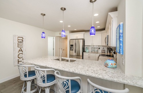 Indian Shores Condo | Beautiful coastal decor 3 bed, 2 bath gulf front condo with magical sunsets!