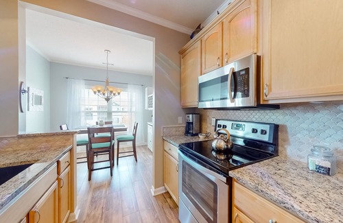 Villages of Five Points Condo | Beautiful condo near ocean with pool, fast WiFi, central AC & washer/dryer