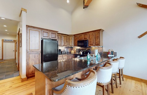 Big Sky Condo | Beautiful condo with mountain views, fireplace, hot-tub, WiFi, and grill
