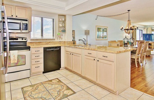 Madeira Beach Condo | Beautiful corner condo w/ample balcony, beach views, W/D, heated pool, pool spa