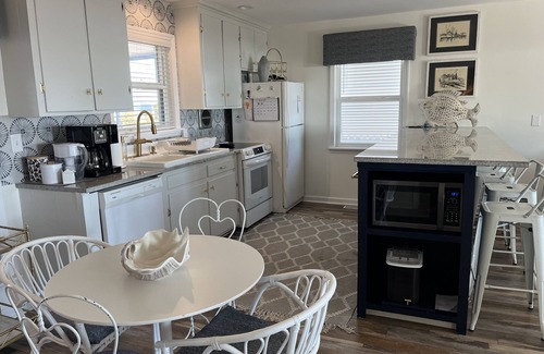 Emerald Isle Cottage | Beautiful cottage w/ocean views - steps away from the beach! Dog Friendly!
