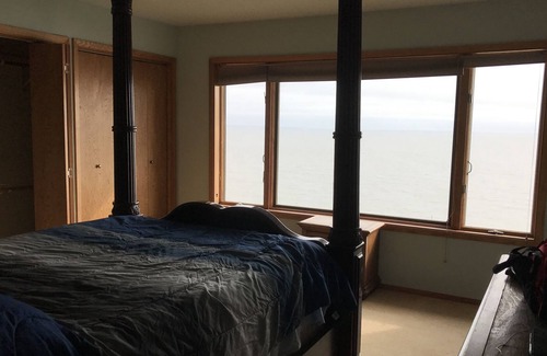 Kenai House | Beautiful getaway located on the bluff with the ocean as your backyard!