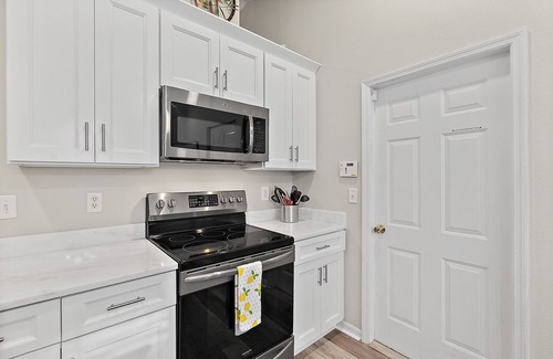 Palm Coast House | Beautiful Heated Pool with Nature Views on Corner Lot- Short Drive to Beaches