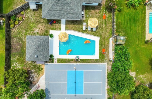 Treasure Cove House | Beautiful home- pickle ball, pool, fire pit, game room, & basketball