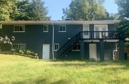 Colerain Township House | Beautiful home Among trees outside the city