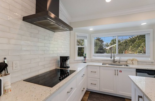 Holmes Beach House | Beautiful Home with Heated Pool and Game Area!