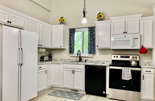 Northeast Raleigh House | Beautiful home with king bed stoned fire place and pool/Games for famlies