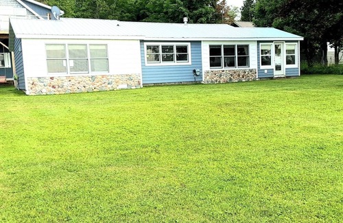 Skanee Cottage | Beautiful Huron Bay sunsets from your own private beach.