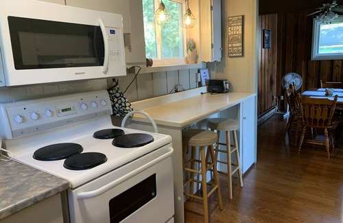 Chisholm Cottage | Beautiful Lakefront Cottage (fishing, boating, hiking, relaxing)
