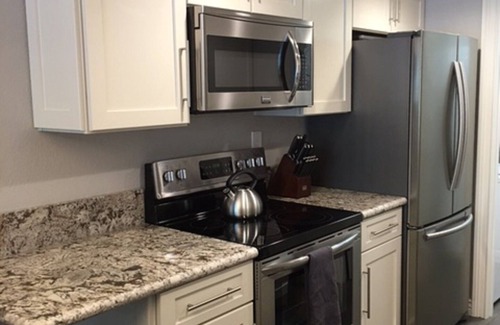 Desert Shores Condo | Beautiful Lakefront Condo with Amazing Views!