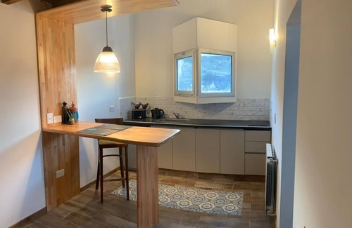 El Chalten Apartment | Beautiful Loft one bedroom apartment in two storeys for up to two guests kitchen