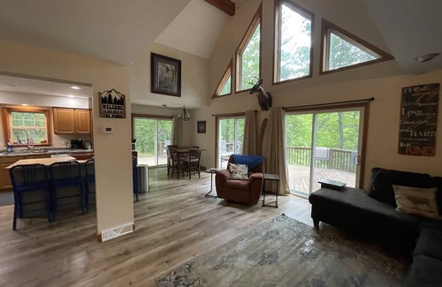 Muskegon House | Beautiful private getaway in updated Cape Cod style home on the river.