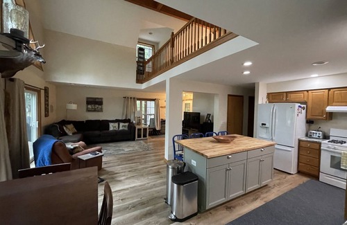 Muskegon House | Beautiful private getaway in updated Cape Cod style home on the river.