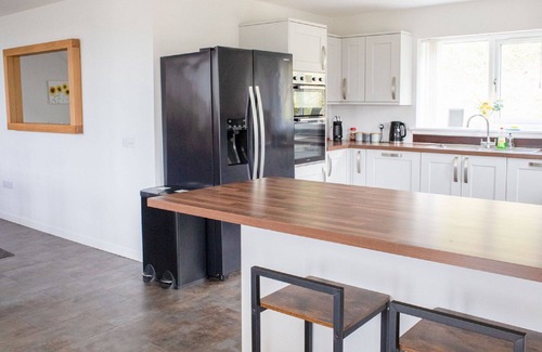 Uig House | Beautiful private villa for 10 guests with hot tub, WIFI, TV, patio, pets allowed and parking