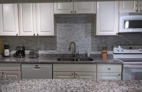 Port Canaveral Condo | Beautiful Renovated Beach side Condo, 1 Short Block To The Beach!
