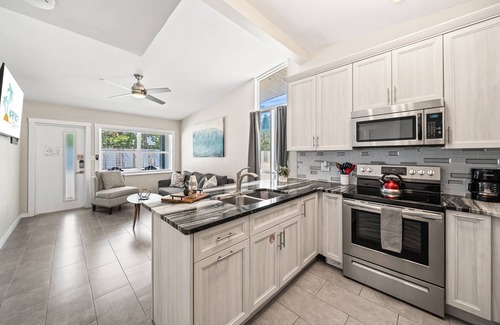 Orlando Beach Condo | Beautiful Riverfront Villa W/Private Beach Access, Fire Pit, & BBQ Grills