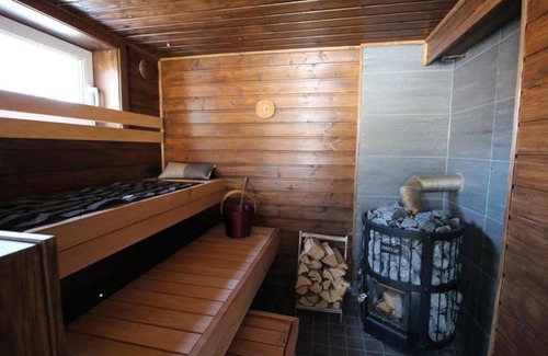 Utsjoki Apartment | Beautiful riverside cottage with sauna