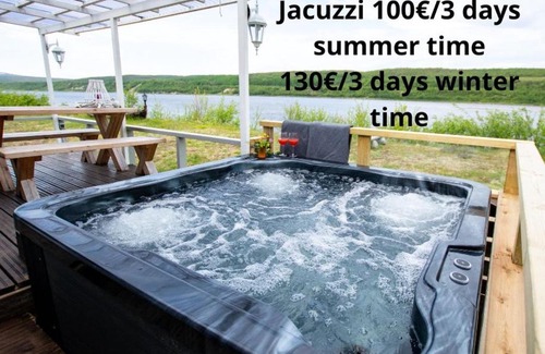 Utsjoki Apartment | Beautiful riverside cottage with sauna