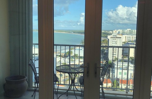 Isla Verde Apartment | Beautiful Studio + Wi-Fi + private parking in ESJ Towers Condominium.