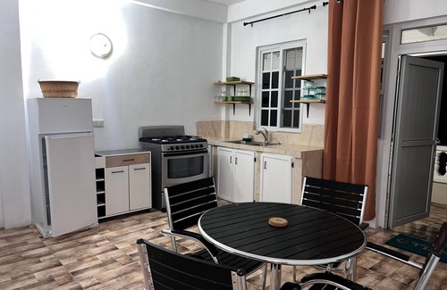 Mahaut Apartment | Beautiful sunset and Mountain View 2 bedroom apt