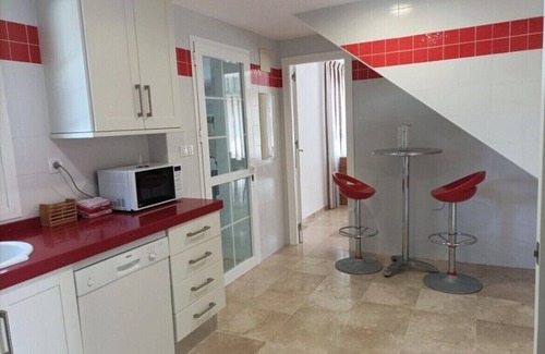 Nuevo Portil Villa | Beautiful villa , close to the beach . Secluded garden with private pool.