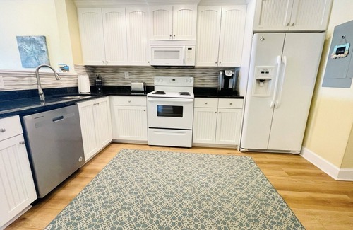 Indian Rocks Beach Condo | BEAUTIFUL Waterfront TWO Balcony End Unit Beach Condo+4 Free Water Park Passes
