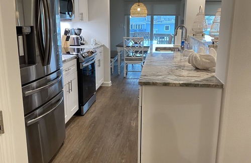 Rockport Condo | Beautiful waterfront condo on Aransas Bay. Pool. Lighted Pier. Tennis. Boat Slip