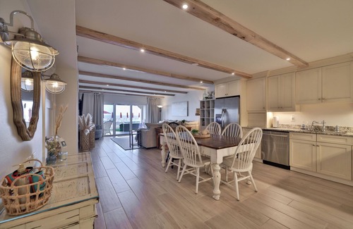 New Smyrna Beach Condo | Beautiful wood floors in this spectacular ground floor three bedroom, three bath.