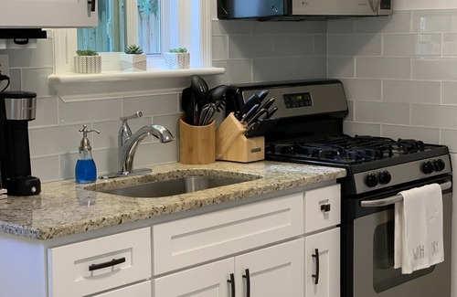 Islip Terrace Apartment | Beautifully decorated1BR Apartment - Full Kitchen, Private Backyard & Fire Pit!