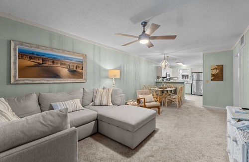 Ocean Sands Condo | Beautifully decorated condo in Corolla with community pool outside!