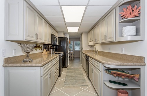Villa Sabine House | Beautifully renovated 3BR townhome with boat slip just steps from the beach!