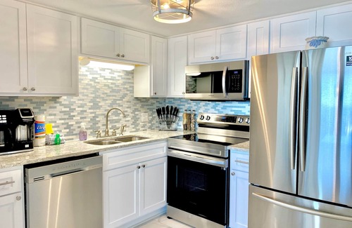Gulf Shores Condo | Beautifully renovated beachfront condo & steps away from Hangout & more! IWE202